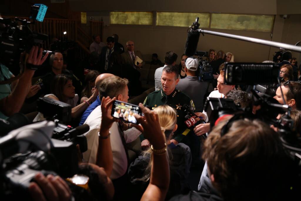 Sheriff Mina with press